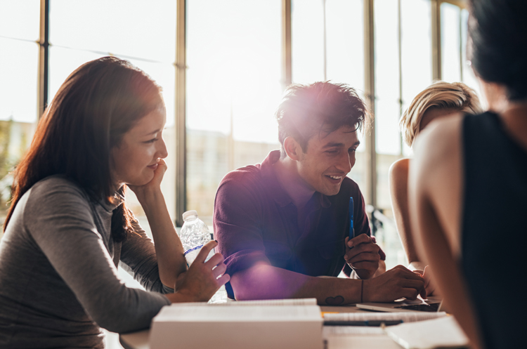 Students studying together at a table