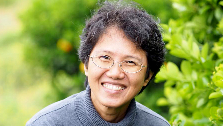 Woman smiling in garden