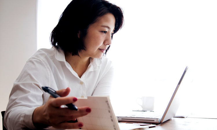 Woman working at laptop