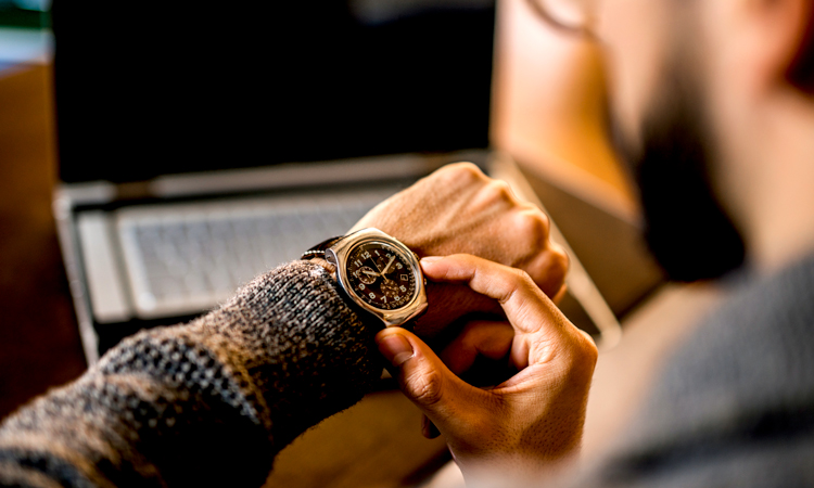 Man looking at watch