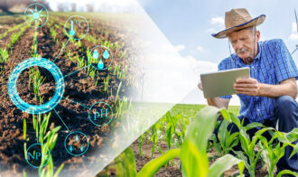 image of male farmer in a field using technology to improve the wellbeing of his crops to produce better food